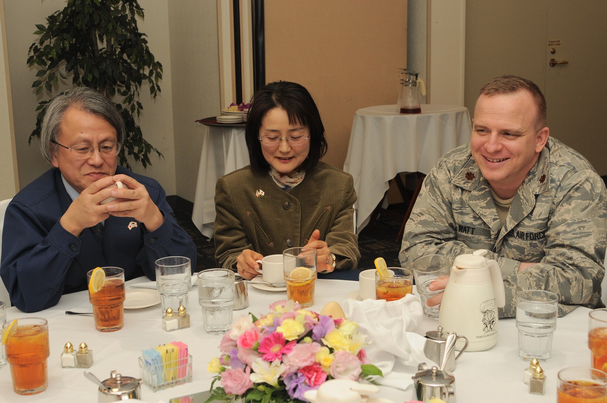 YOKOTA AIR BASE, Japan -- Mr. Akira Tanabe, Ome Yokota Friendship Club chief director, Mrs. Wakako Tanabe, wife of Mr. Tanabe and Maj. Christoper Watt, chief of Public Affairs visit during a Friendship Club Lunch at the Enlisted Club, Feb. 26. Local Japanese business and political leaders began forming the six community friendship clubs in 1989 as a way to show their appreciation for U.S. forces in Japan and to introduce Japanese culture to Yokota Airmen and their families.
(U.S. Air Force photo/TSgt Juaacklyn Denny)  
