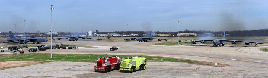 BARKSDALE AIR FORCE BASE, La. - Four B-52H Stratofortresses start up their engines as they prepare to make their way to the runway during a Nuclear Operational Readiness Exercise here Feb 25. The exercise tested the wing’s operations planning and ability to generate a large number of B-52s to support the global strike mission. (U.S. Air Force photo by Senior Airman La’Shanette V. Garrett) (RELEASED)