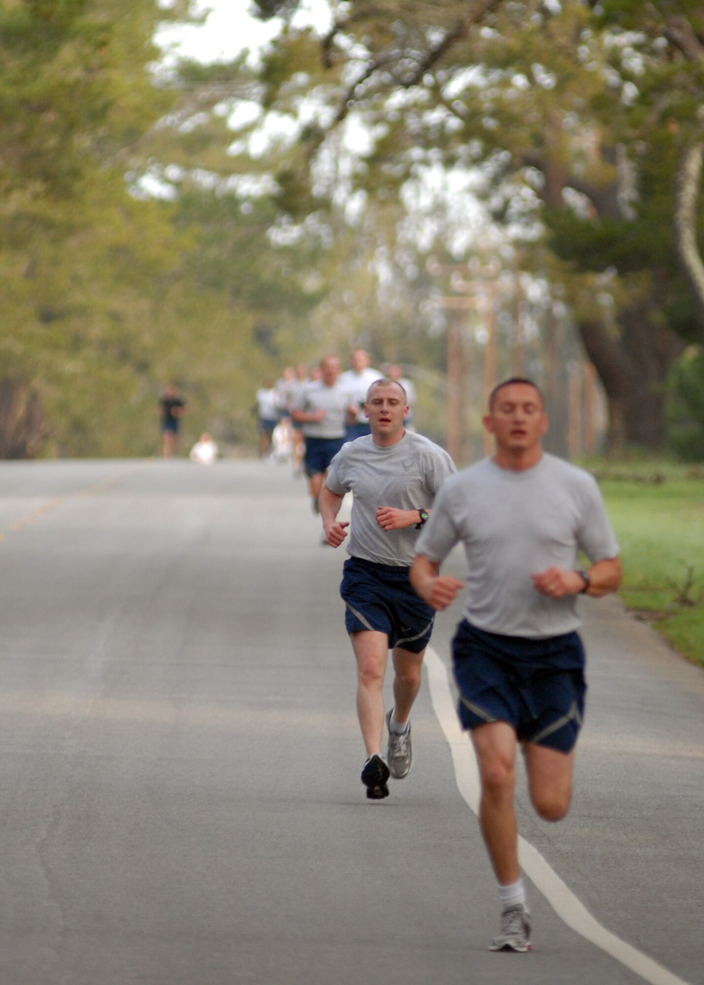 VANDENBERG AIR FORCE BASE, Calif. -- As the first runners lead the way, the Vandenberg Fit-to-Fight Run comes to a close here Friday, Feb. 26, 2010. The 5K wing run is held every month in order to maintain a high standard of physical fitness throughout the base. (U.S. Air Force photo/Airman 1st Class Angelina Drake)