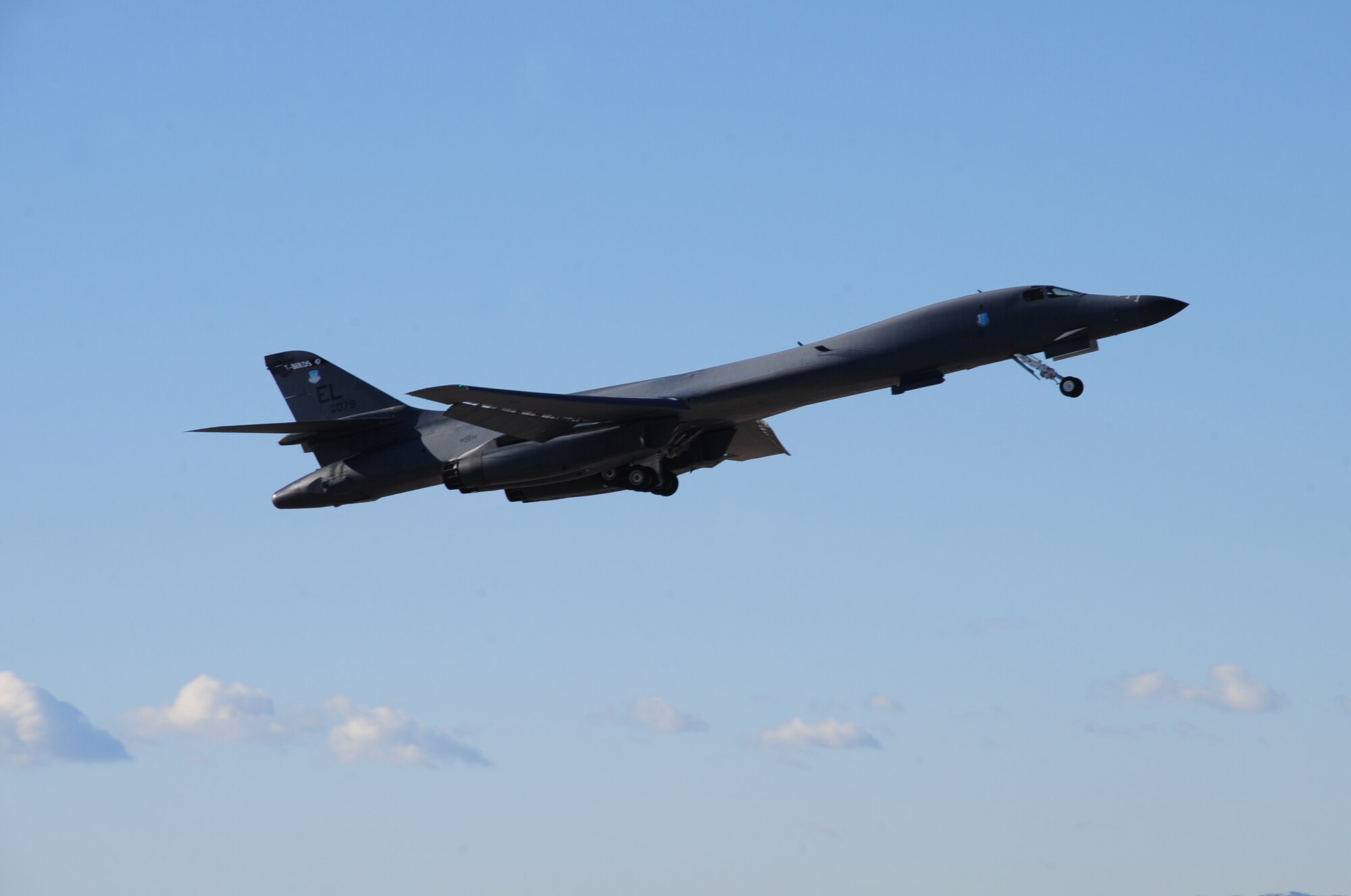 ELLSWORTH AIR FORCE BASE, S.D. -- A B-1B Lancer from the 34th Bomb Squadron takes off as Col. Kory Cornum, Air Combat Command's command surgeon, flew in the bomber, Feb. 26.  Col. Cornum visited Ellsworth to recognize 28th Medical Group personnel for outstanding performance. (U.S. Air Force photo/Airman 1st Class Anthony Sanchelli)
