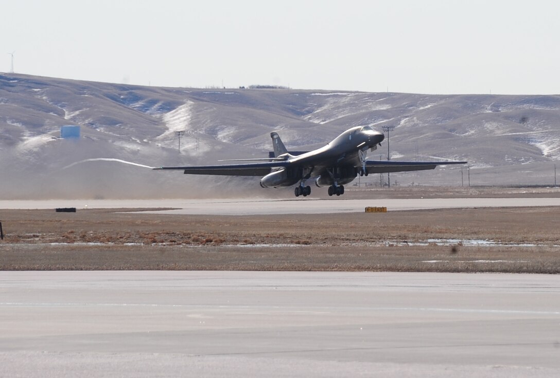 ELLSWORTH AIR FORCE BASE, S.D. -- A B-1B Lancer from the 34th Bomb Squadron takes off carrying Col. Kory Cornum, Air Combat Command's command surgeon, Feb. 26.  Col. Cornum visited Ellsworth to recognize 28th Medical Group personnel for outstanding performance. (U.S. Air Force photo/Airman 1st Class Anthony Sanchelli)