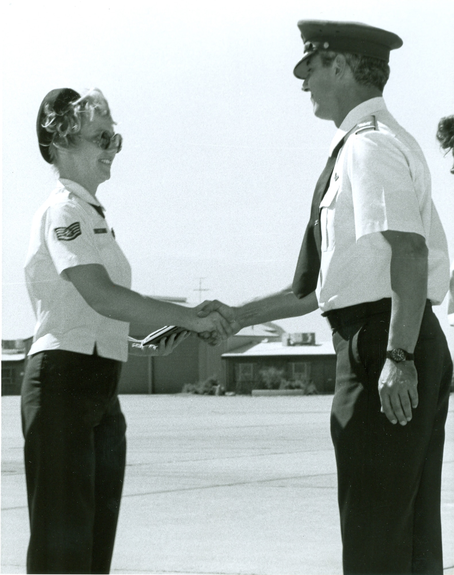 Brenda West, a staff sergeant in 1985, receives the Air Force Association Tucson Chapter Air National Guard Member of the Year award from Maj. Gen. Glen Van Dyke, then a colonel and commander of the unit. (Courtesy photo)