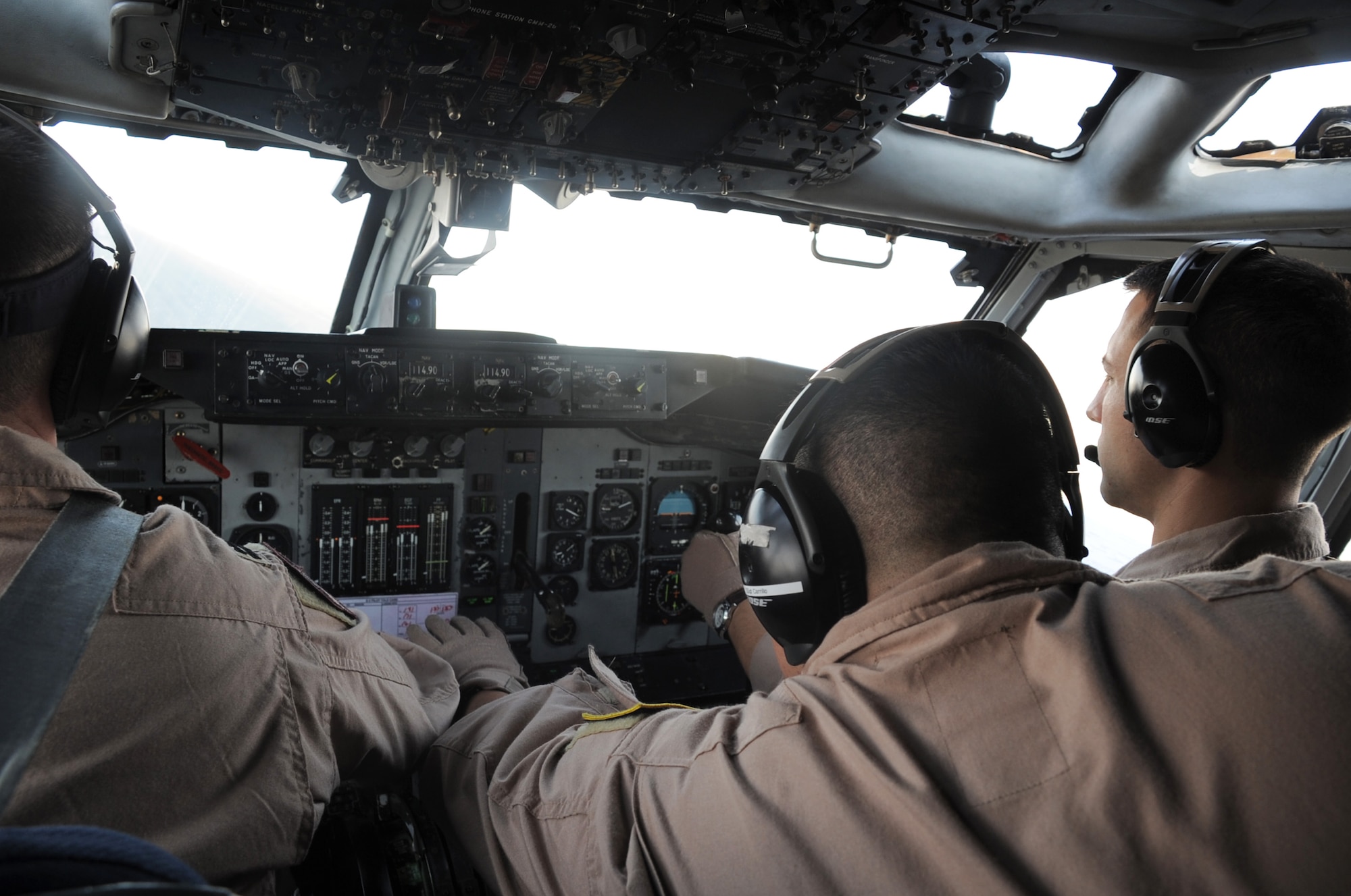 Aircrew Airmen guide an E-3 Sentry into the air for a deployed air mission during operations at a non-disclosed base in Southwest Asia on Feb. 16, 2010. The crew is from the 965th Expeditionary Aircraft Airborne Air Control Squadron -- part of the 380th Air Expeditionary Wing. Their home station is Tinker Air Force Base, Okla. (U.S. Air Force Photo/Master Sgt. Scott T. Sturkol/Released)