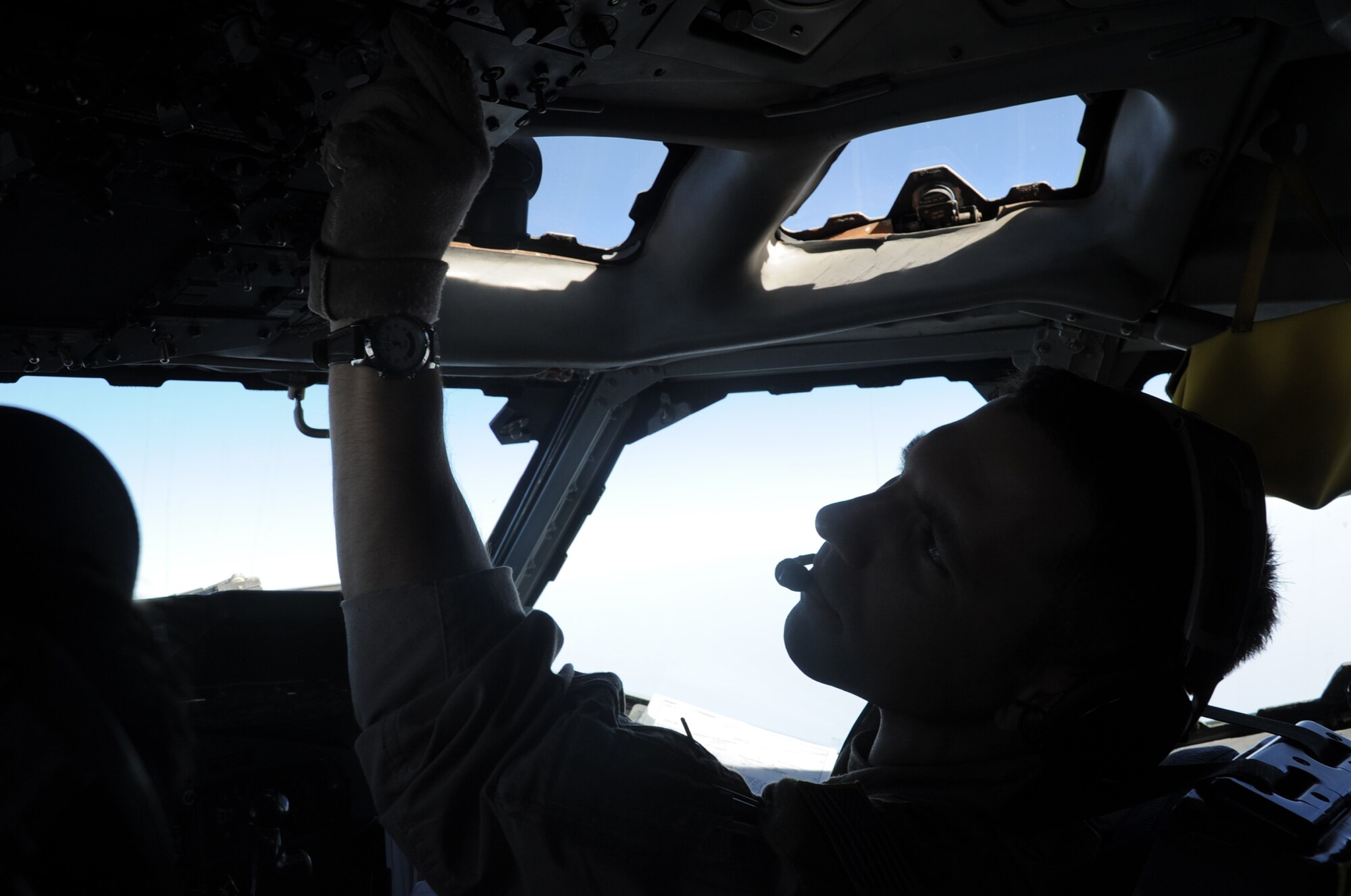 First Lt. Anthony Dorazio, E-3 Sentry Airborne Warning and Control System aircraft co-pilot, flies an E-3 Sentry on a combat air mission during operations over the Persian Gulf in Southwest Asia on Feb. 16, 2010. He is deployed with the 965th Expeditionary Aircraft Airborne Air Control Squadron -- part of the 380th Air Expeditionary Wing at a non-disclosed base in Southwest Asia. His home station is Tinker Air Force Base, Okla., and his hometown is Clovis, N.M. (U.S. Air Force Photo/Master Sgt. Scott T. Sturkol/Released)