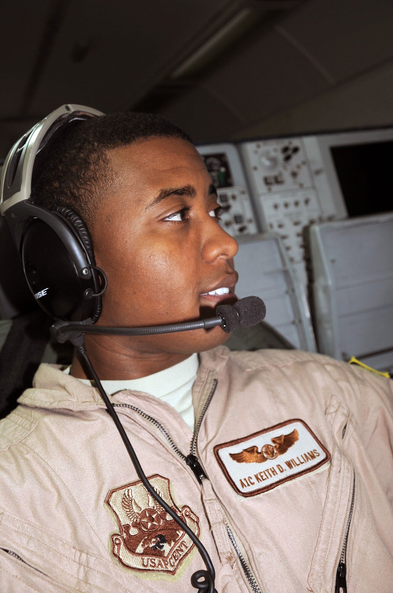 Airman 1st Class Keith Williams, an E-3 Sentry Airborne Warning and Control System aircraft air surveillance technician with the 965th Expeditionary Airborne Air Control Squadron, flies on a deployed E-3 air mission in Southwest Asia on Feb. 16, 2010. Airman Williams is deployed from Tinker Air Force Base, Okla., and his hometown is North Hollywood, Calif. (U.S. Air Force Photo/Master Sgt. Scott T. Sturkol/Released)