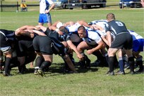 Marvin Mays, at right, fills the prop position for the Air Force in a scrum during the 2009 Armed Forces Rugby Championship at Fort Benning, Ga. Air Force beat Army 34-0 to capture its sixth straight title. (Photo by Vince Little)