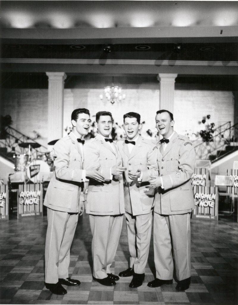 Vocal and instrumental group, “The Four Saints”.  Members are (left to right): John Howell, Doug Evans, Jerry DuChene, and Bob Erickson.  If you have any other stories you can share about the event, please email our Band Historian <a href="mailto:usafbandhistorian@afncr.af.mil">Technical Sgt. Tracey MacDonald</a>. Thank you and we look forward to hearing from you!  This is Photo 27. (Unknown Photo)