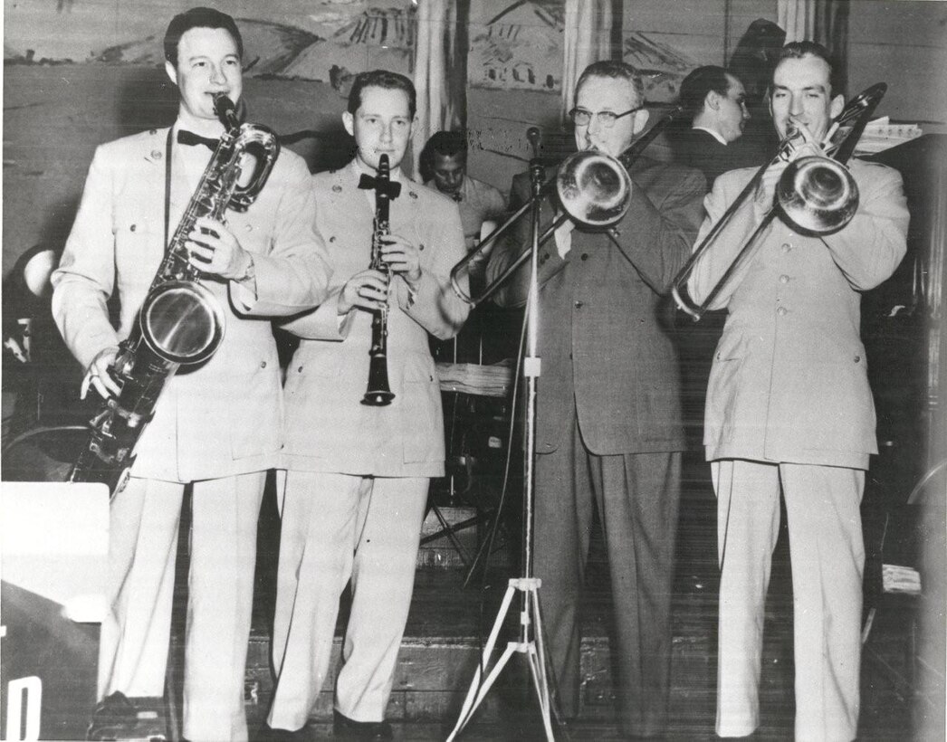 Members of the Airmen of Note performing with Tommy Dorsey.  Left to Right: Bruce Snyder on Baritone saxophone, Walt Levinsky on Clarinet, Tommy Dorsey on Trombone, and Greg Phillips on Trombone.  If you have any other stories you can share about the event, please email our Band Historian <a href="mailto:usafbandhistorian@afncr.af.mil">Technical Sgt. Tracey MacDonald</a>. Thank you and we look forward to hearing from you!  This is Photo 26. (Unknown Photographer)