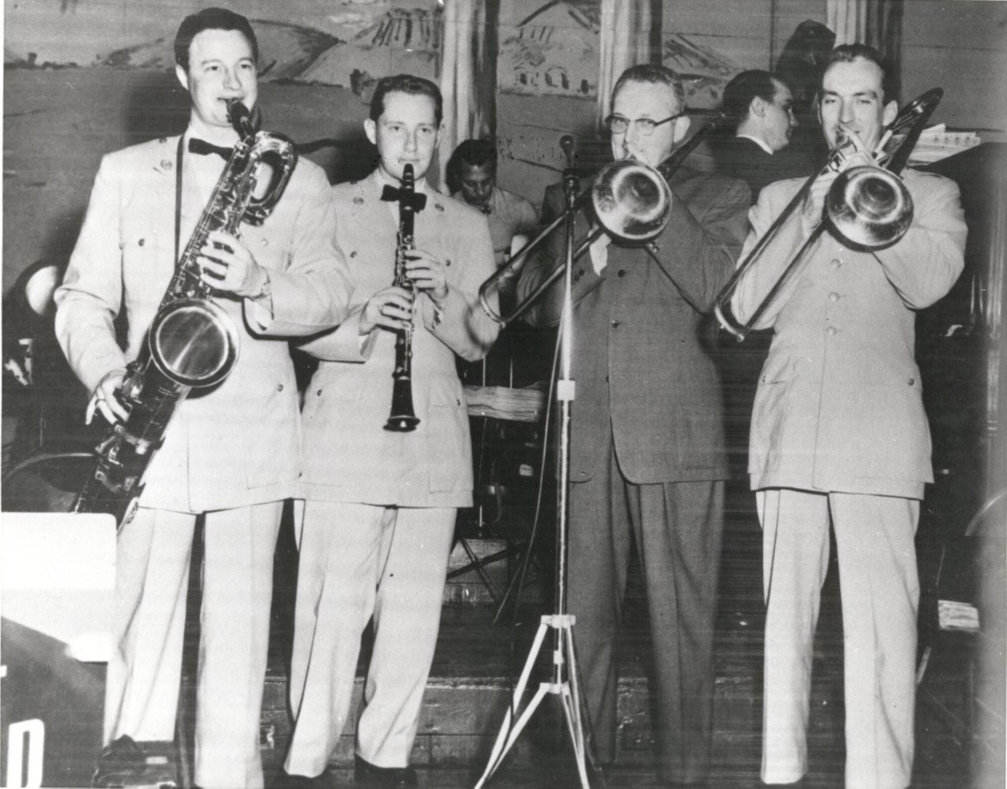 Members of the Airmen of Note performing with Tommy Dorsey.  Left to Right: Bruce Snyder on Baritone saxophone, Walt Levinsky on Clarinet, Tommy Dorsey on Trombone, and Greg Phillips on Trombone.  If you have any other stories you can share about the event, please email our Band Historian <a href="mailto:usafbandhistorian@afncr.af.mil">Technical Sgt. Tracey MacDonald</a>. Thank you and we look forward to hearing from you!  This is Photo 26. (Unknown Photographer)