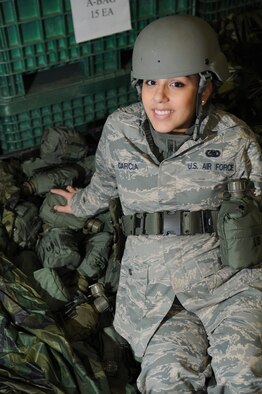 U.S. Air Force Airman 1st Class Erica Garcia, individual practice equipment apprentice, 86th Logistic Readiness Squadron, poses for a photo, Ramstein Air Base, Germany, Feb. 24, 2010. "I will be my daughters hero," says Garcia about her child, due on March 1st. (U.S. Air Force photo by Airman Desiree Esposito)