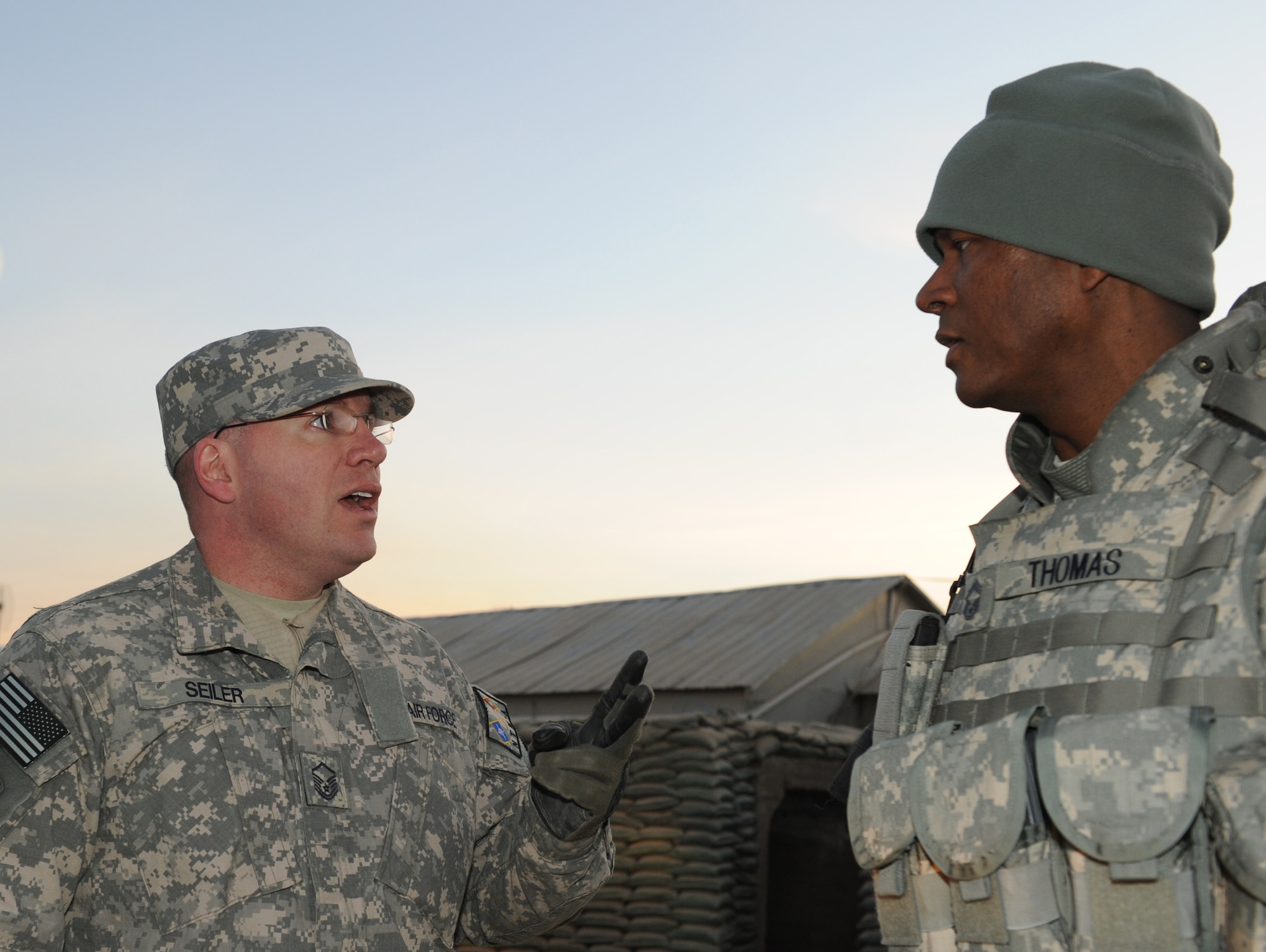 U.S. Air Force Master Sergeant Seiler (Left) discusses convoy safety procedures with Chief Master Sgt. Terrell Thomas, 955th Air Expeditionary Squadron superintendent, prior to a three day convoy to forward operating bases in Regional Command East, Jan. 19, 2010. (U.S. Air Force photo by/ Staff Sgt. Richard Williams)