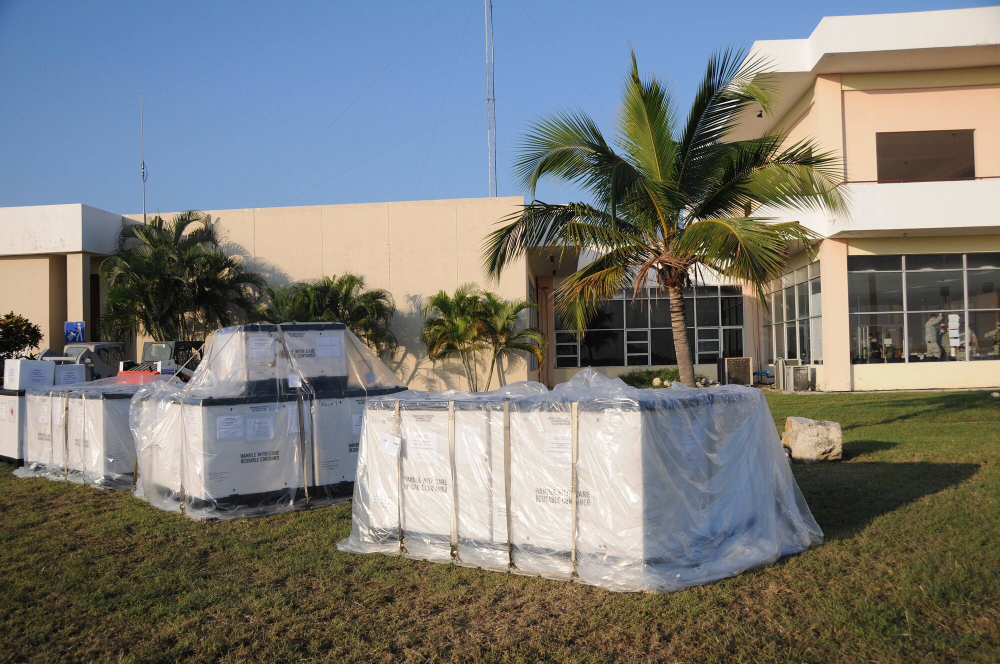 Vital medical supplies await pick-up at an air hub in Barahona, Dominican Republic,  Jan. 24 after being delivered by U.S. Air Force airlift for the vicitms of the earthquake in Haiti. The Kentucky Air Guard's 123rd Contingency Response Group established the hub Jan. 22 to process inbound humanitarian aid. Volunteers and medical professionals from nongovernmental relief organizations are pouring in to the Dominican Republic to assist wounded Haitian refugees. (U.S. Air Force photo by Tech. Sgt. Dennis Flora)
