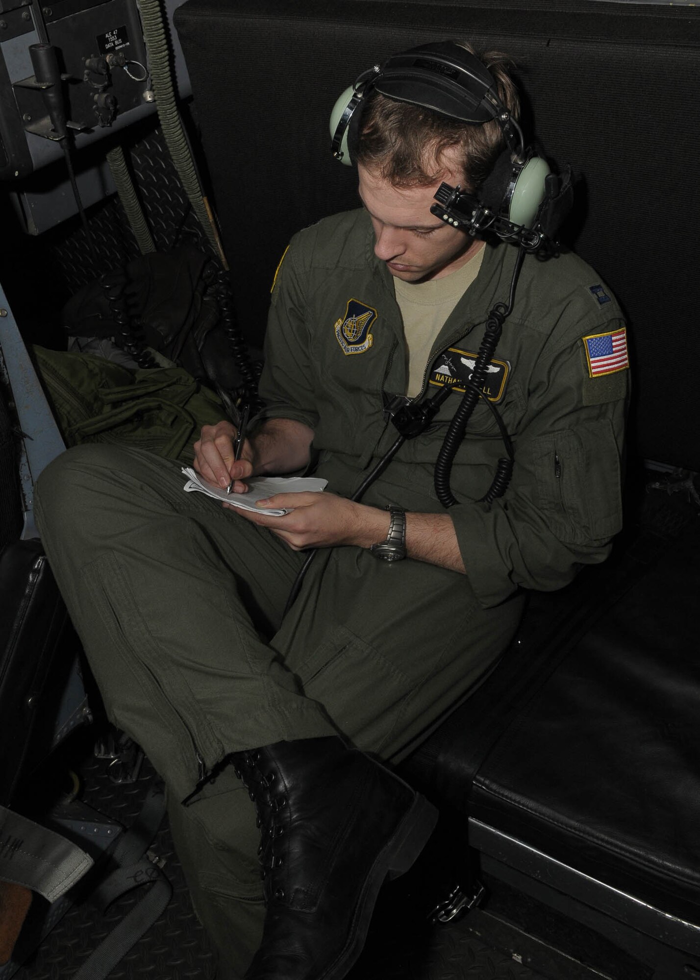 KADENA AIR BASE, Japan -- Capt. Nathan Powell, 36th Airlift Squadron pilot, gathers information Feb. 23 during joint bilateral training at Kadena Air Base. (U.S. Air Force photo/Airman 1st Class Sean Martin)