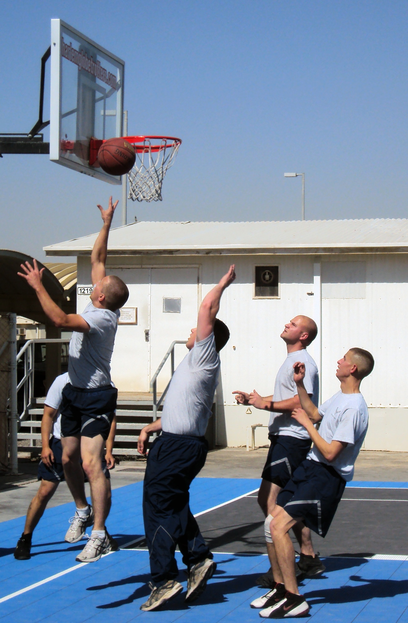 Airmen from the 380th Air Expeditionary Wing play a game of basketball in their minimal off-time while deployed to a non-disclosed base in Southwest Asia on Feb. 7, 2010. The 380th AEW supports operations Iraqi Freedom and Enduring Freedom and the Combined Joint Task Force-Horn of Africa. (U.S. Air Force Photo/Master Sgt. Scott T. Sturkol/Released)