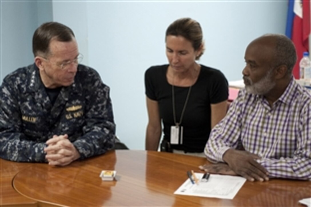 U.S. Navy Adm. Mike Mullen, left, chairman of the Joint Chiefs of Staff, meets with Haitian President Rene Garcia Preval during a visit to Port-au-Prince, Haiti, Feb. 26, 2010. U.S. forces are conducting humanitarian missions in Haiti in the wake of the Jan. 12 earthquake that devastated the Caribbean nation.