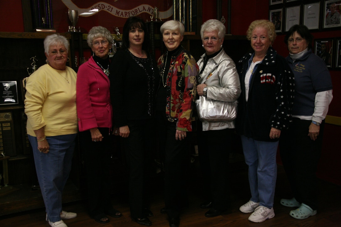 Members of the Ladies Auxiliary to the Veterans of Foreign Wars, visited Cherry Point’s Aerial Port of Embarkation during a trip to learn more about the air station and the surrounding area. ::r::::n::From left, Jeanette Clark, the president for the Ladies Auxiliary VFW, N.C.; Farris Opton, the chief of staff for Ladies Auxiliary VFW, N.C. department; Lynn Jones, the president for the Ladies Auxiliary VFW, N.C. department; Jan Tittle, the president of the National Ladies Auxiliary VFW; Ann Yamrus, a national council member of the Ladies Auxiliary VFW of North and South Carolina; Maria Myers, the president for the Ladies Auxiliary VFW, Beaufort, N.C.; Nancy White, a past department president and member of the Ladies Auxiliary VFW, New Bern, N.C. ::r::::n::