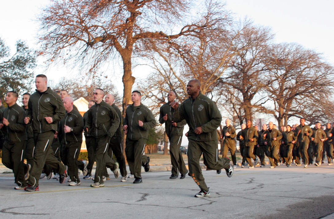 NAVAL AIR STATION JOINT RESERVE BASE FORT WORTH, Texas (Feb. 29, 2009) -- Sergeant Major JB Edwards calls cadence for the Marines of Recruiting Station Fort Worth during thier unit run here. This was the first time the Marines, also known as the "Spartans," were able to get all 90 troops together for physical training. (U.S. Marine Corps photo by Sgt. Ray Lewis)