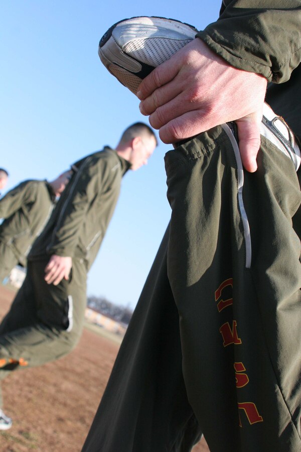 NAVAL AIR STATION JOINT RESERVE BASE FORT WORTH, Texas (Feb. 29, 2009) --  The Marines of Recruiting Station Fort Worth do cool-down stretches after thier unit run here. This was the first time the Marines, also known as the "Spartans," were able to get all 90 troops together for physical training. (U.S. Marine Corps photo by Sgt. Ray Lewis)