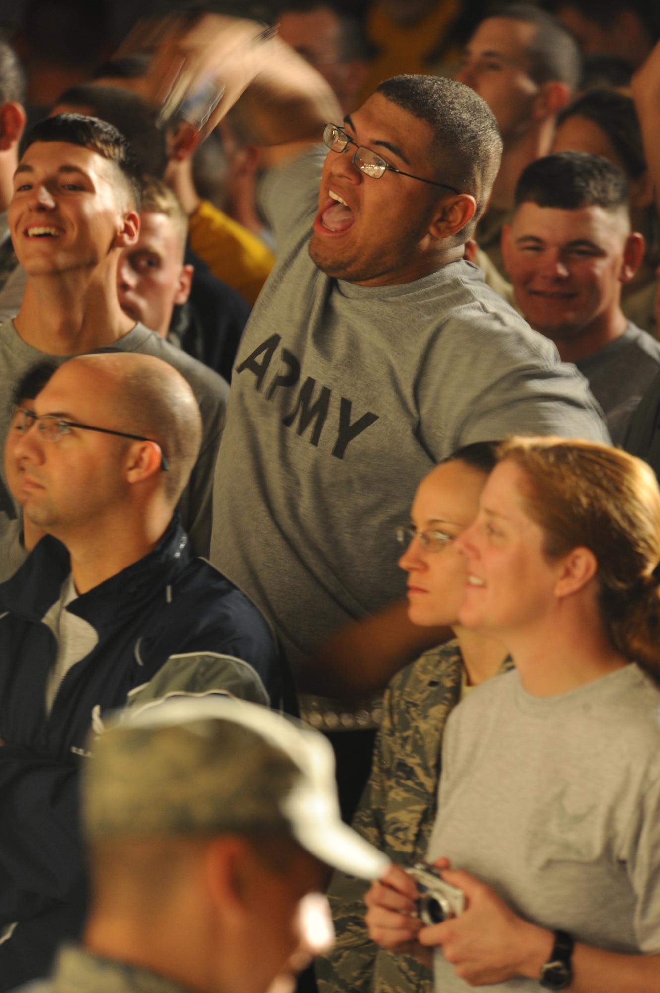 A Soldier reacts during a USO-sponsored Saving Abel concert a non-disclosed Southwest Asia location Feb. 22, 2010. (U.S. Air Force photo by Senior Airman Kasey Zickmund)[RELEASED]