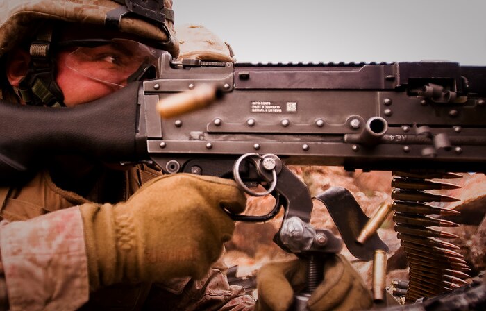 Pfc. Corey J. Bishop, a machine gunner with Weapons Platoon, India Company, 3rd Battalion, 3rd Marine Regiment, and an Alexander City, Ala. native, lays down suppressive fire during a company assault exercise at Range 400 at Marine Corps Air Ground Combat Center Twentynine Palms, Calif. Feb. 28.