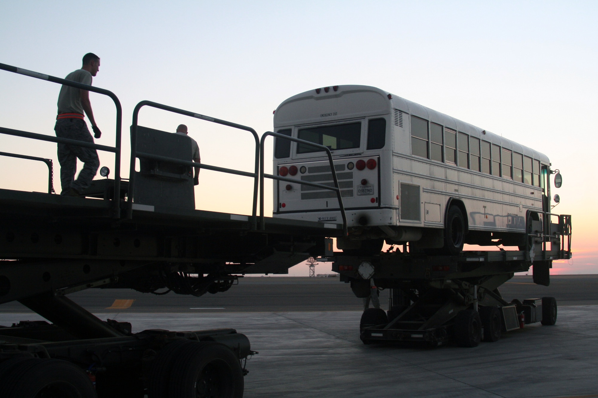 Air transportation Airmen assigned to the 380th Expeditionary Logistics Readiness Squadron Air Terminal Operations Center load a 44-passenger bus weighing more than 20,000 pounds onto a Russian-built IL-76 transport plane during operations at a non-disclosed base in Southwest Asia on Dec. 30, 2009. The bus was one of two that were loaded on the IL-76 for transport to Afghanistan. The 380th Air Expeditionary Wing supports Operations Iraqi Freedom and Enduring Freedom and the Combined Joint Task Force-Horn of Africa.  (U.S. Air Force Photo/Tech. Sgt. Scott T. Sturkol)