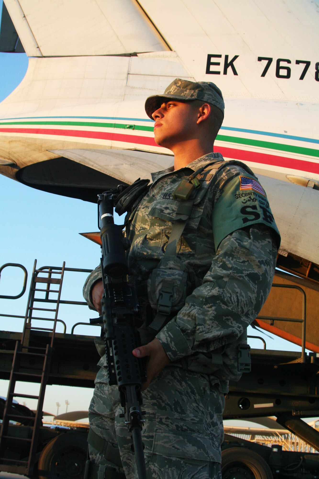 Airman 1st Class Johnny Hinojosa, security forces journeyman assigned to the 380th Expeditionary Security Forces Squadron, watches over the flightline at a non-disclosed base in Southwest Asia on Dec. 30, 2009. The 380th ESFS and the 380th Air Expeditionary Wing support Operations Iraqi Freedom and Enduring Freedom and the Combined Joint Task Force-Horn of Africa. Airman Hinojosa is deployed from the 3rd Security Forces Squadron at Elmendorf Air Force Base, Alaska, and his hometown is San Diego, Calif. (U.S. Air Force Photo/Tech. Sgt. Scott T. Sturkol)