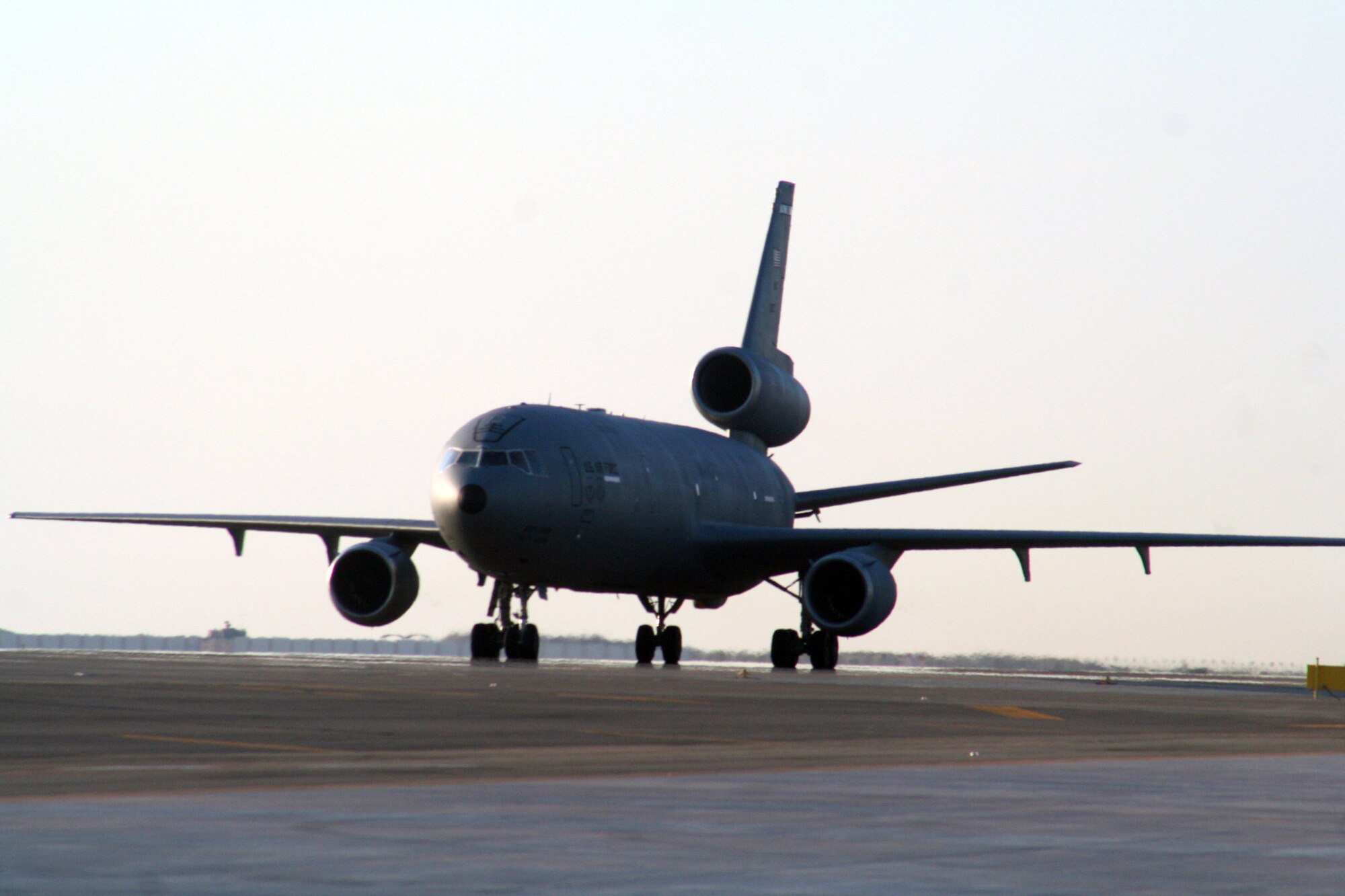 A KC-10 Extender taxis on the flightline at a non-disclosed location in Southwest Asia on Dec. 30, 2009. KC-10 Extenders are one of the airframes deployed to the 380th Air Expeditionary Wing providing air refueling support for Operations Enduring Freedom and Iraqi Freedom and Joint Task Force-Horn of Africa. The KC-10 is an Air Mobility Command advanced tanker and cargo aircraft that can move up to 170,000 pounds of cargo or carry more than 356,000 pounds of fuel. (U.S. Air Force Photo/Tech. Sgt. Scott T. Sturkol)