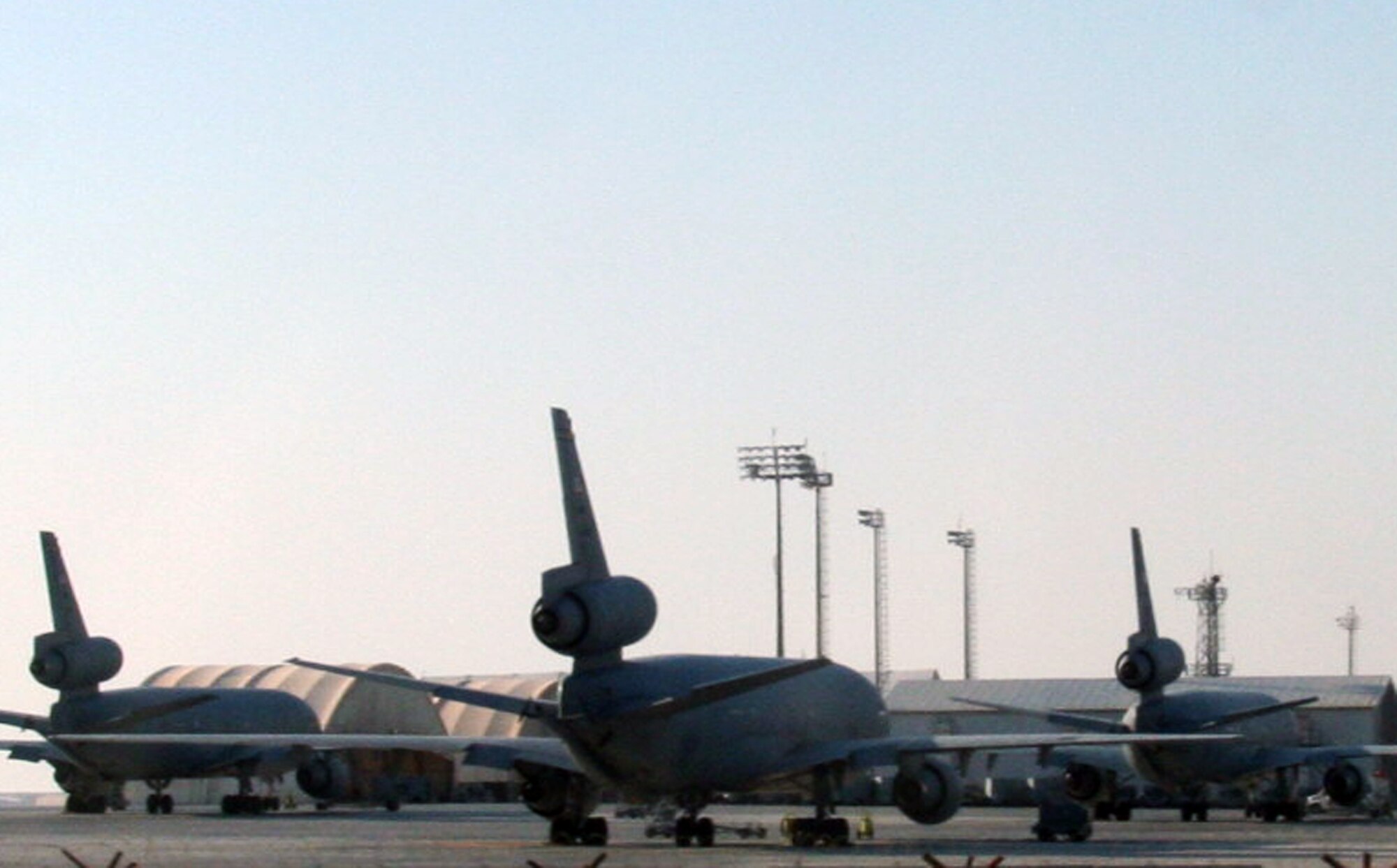 KC-10 Extender aircraft assigned to the 908th Expeditionary Air Refueling Squadron are parked on the flightline at a non-disclosed base in Southwest Asia on Dec. 30, 2009. Through the use of the KC-10 and other airframes, the 380th Air Expeditionary Wing supports Operations Iraqi Freedom and Enduring Freedom and the Combined Joint Task Force-Horn of Africa.  (U.S. Air Force Photo/Tech. Sgt. Scott T. Sturkol)