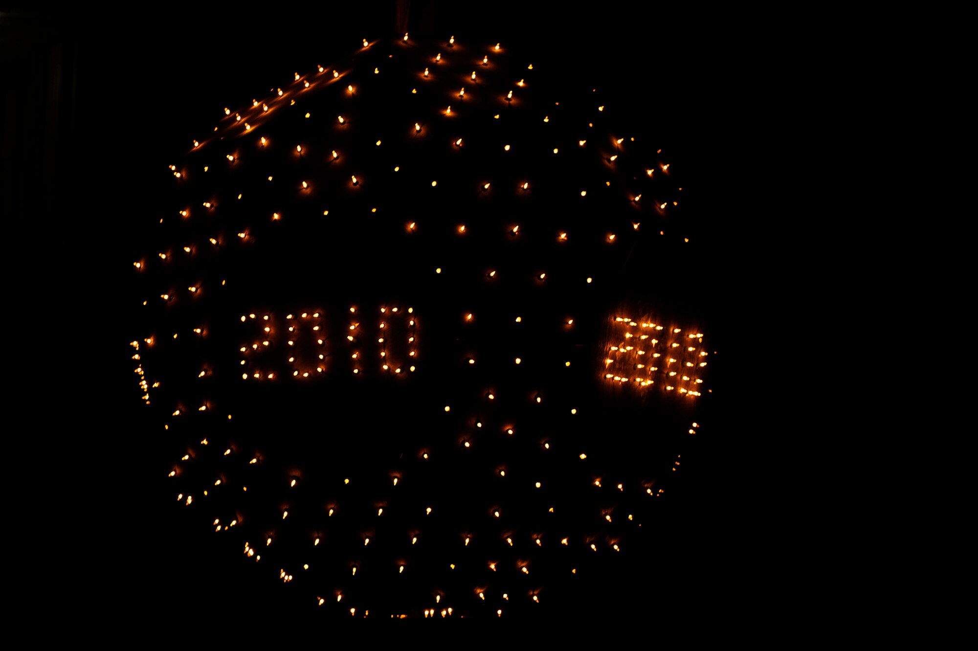 BAGRAM AIRFIELD, Afghanistan--Airman at Bagram Airfield celebrate the New Year by lowing a 6-foot-in-diameter ball, Jan. 1, 2010, built by the 455th Expeditionary Civil Engineer Squadron.  (U.S. Air Force photo by: Tech. Sgt. Jeromy K. Cross)