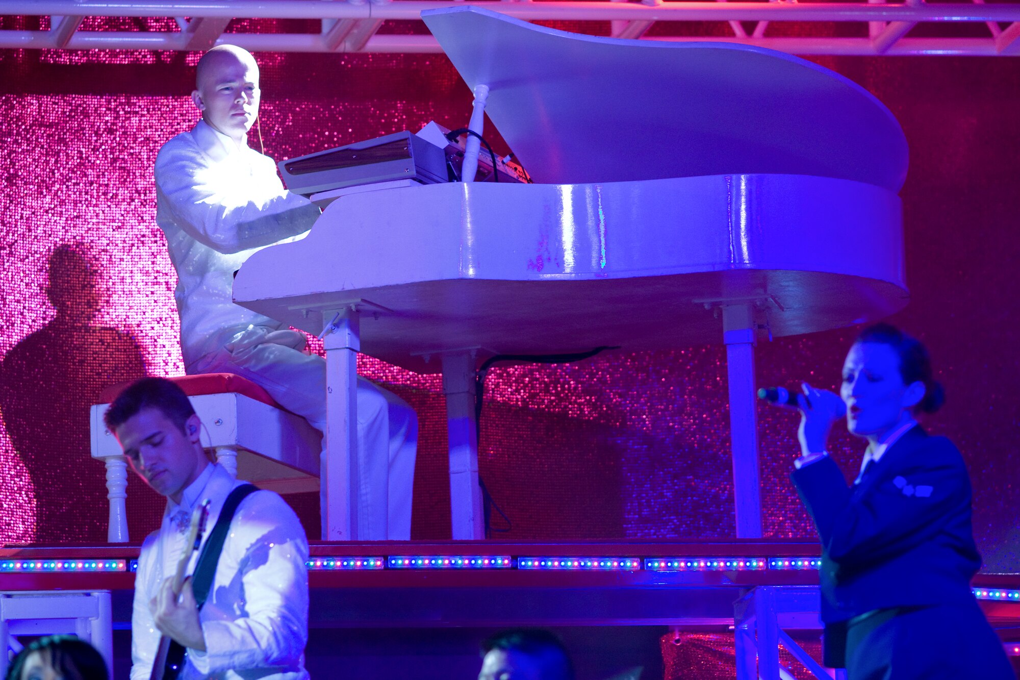 YOKOTA AIR BASE, Japan -- Airman 1st Class Adam Sims, 374th Airlift Wing, performs Keyboard during Tops in Blue tour here Dec. 30. Airman Sims assigns the 56th Tops in Blue members as keyboard section and tours more than 120 shows worldwide. (U.S. Air Force photo/Osakabe Yasuo)