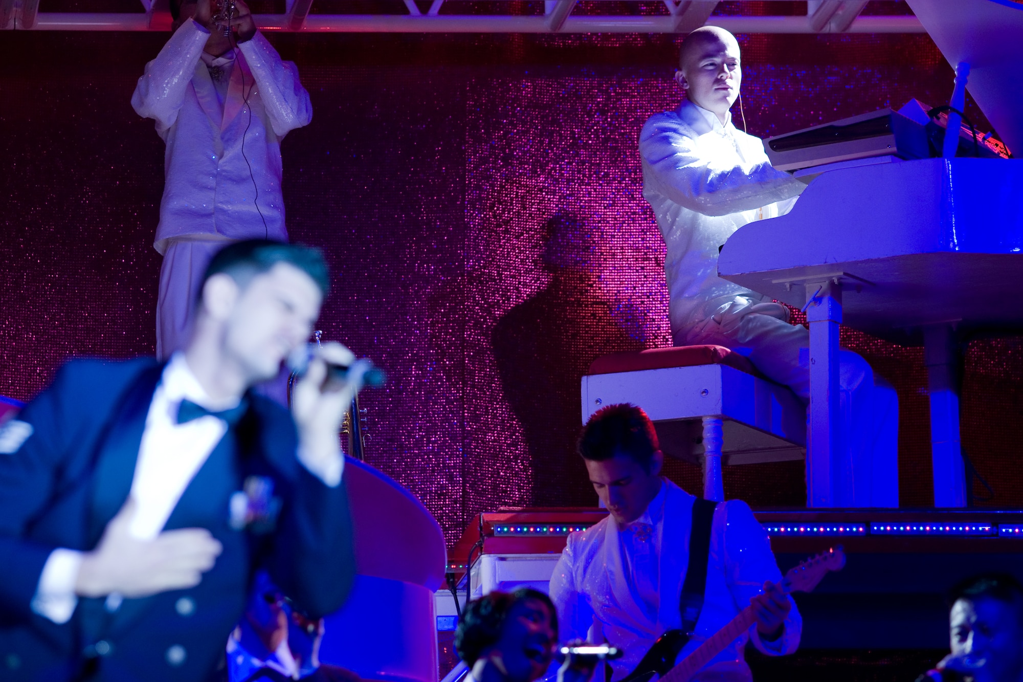 YOKOTA AIR BASE, Japan -- Airman 1st Class Adam Sims, 374th Airlift Wing, performs Keyboard during Tops in Blue tour here Dec. 30. Airman Sims assigns the 56th Tops in Blue members as keyboard section and tours more than 120 shows worldwide. (U.S. Air Force photo/Osakabe Yasuo)