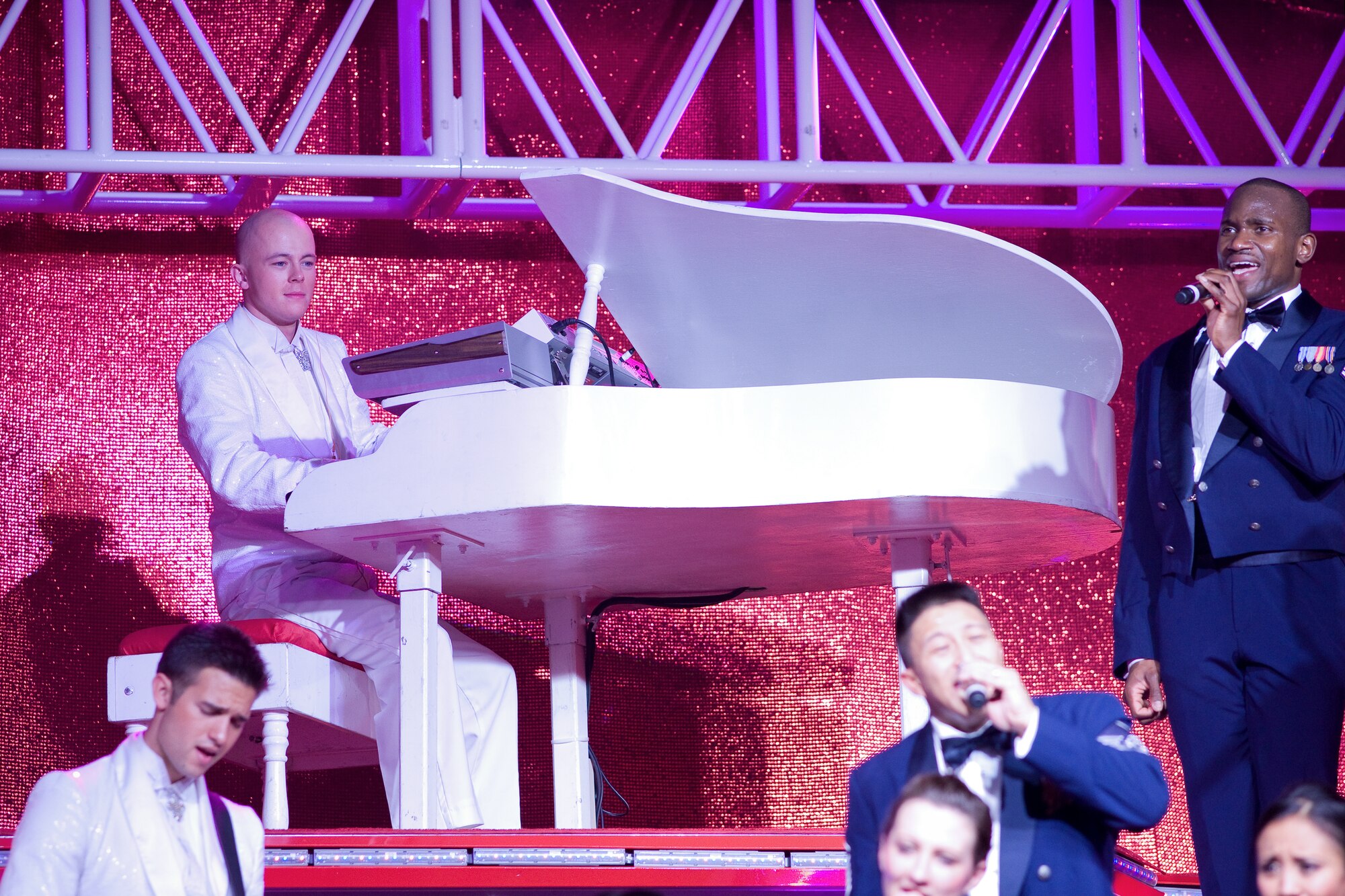 YOKOTA AIR BASE, Japan -- Airman 1st Class Adam Sims, 374th Airlift Wing, performs Keyboard during Tops in Blue tour here Dec. 30. Airman Sims assigns the 56th Tops in Blue members as keyboard section and tours more than 120 shows worldwide. (U.S. Air Force photo/Osakabe Yasuo)