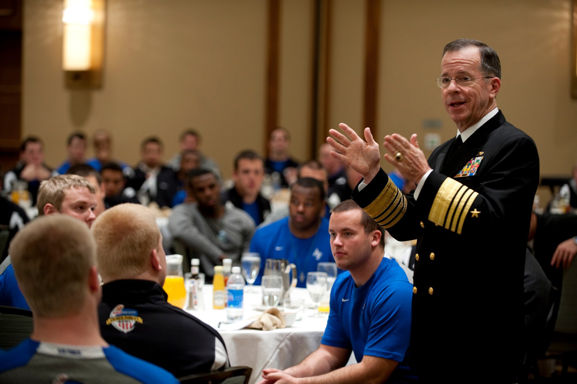 Adm. Mike Mullen, chairman of the Joint Chiefs of Staff, addresses members of the Air Force Academy Falcons football team Dec. 30, 2009, before their appearance in the Armed Forces Bowl in Fort Worth, Texas. On Dec. 31, the Falcons won the bowl game,  defeating the University of Houston Cougars 47-20.  (Defense Department photo/Petty Officer 1st Class Chad J. McNeeley)