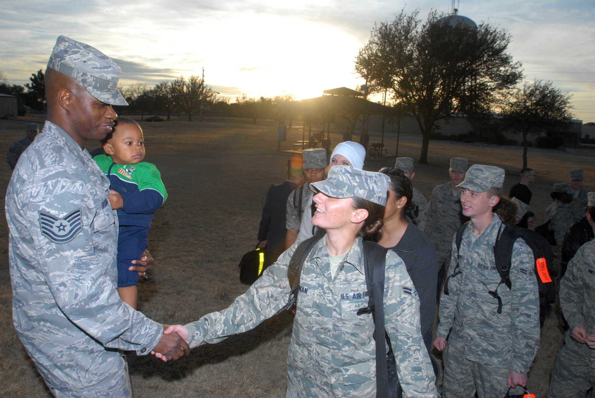 Airmen assigned to the 17th Training Group Goodfellow AFB, Texas congratulate Staff Sergeant Jonathan Session, a Military Training Leader with the 316th Training Squadron, on his promotion to technical sergeant on Dec. 18.  Staff Sgt. Sessions found out he was STEP (Stripes for Exceptional Performers) promoted to Tech. Sgt.  His promotion was announced in front of a formation of students as they were preparing to leave Goodfellow AFB, Texas for the holidays.  (US Air Force photo by Master Sgt. Randy Mallard)