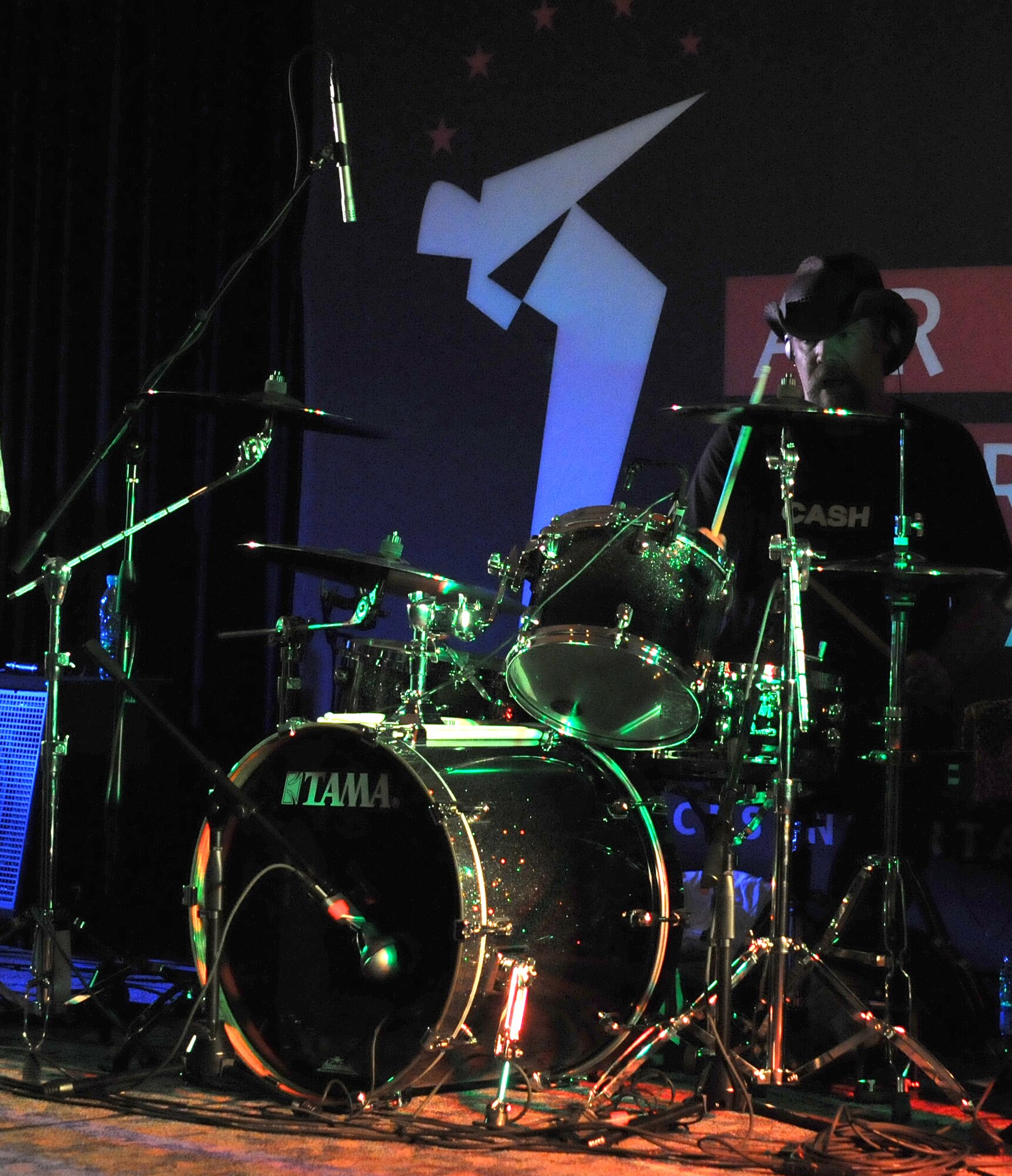 Robert Roewe, drummer for the Jimmy Kennedy and the Wrecking Ball band, sets the beat during a New Years Eve bash Thursday, Dec. 31, 2009 at Incirlik’s consolidated club.  The band visited Incirlik Air Base from St. Louis, Missouri, as part of an Armed Forces Entertainment tour for the troops during the holidays.  (U.S. Air Force photo/Senior Airman Ashley Wood)  