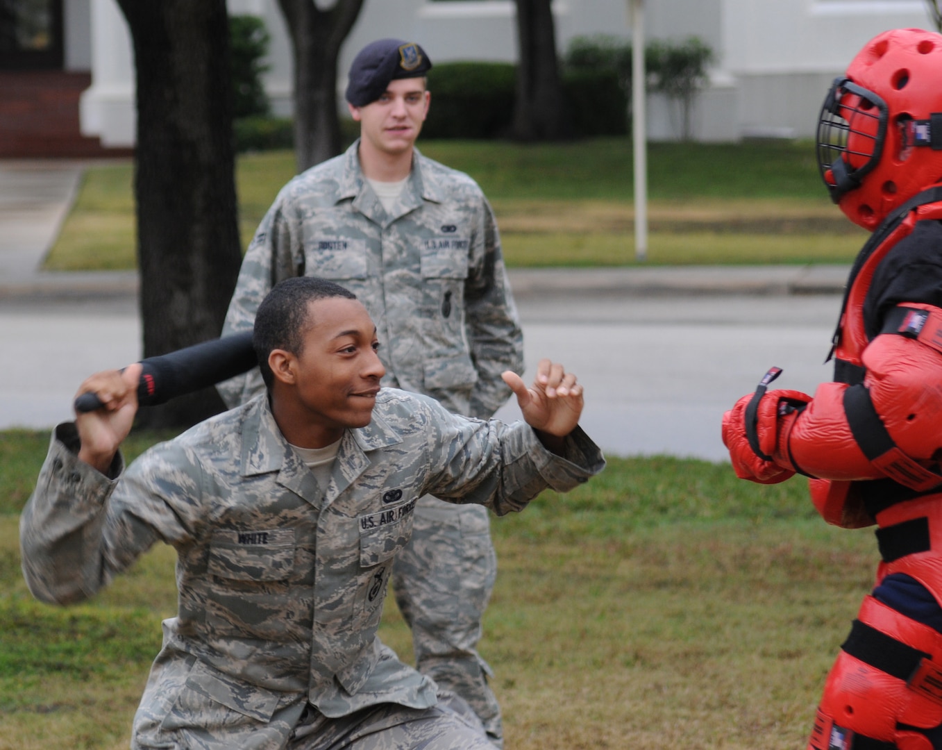Airman 1st Class Quentin White, 12th Security Forces Squadron, attempts to hit Maj. Frank Hellstern during baton training.  The training teaches security forces Airmen how to engage an opponent using non-deadly force. (U.S. Air Force photo/Don Lindsey) 