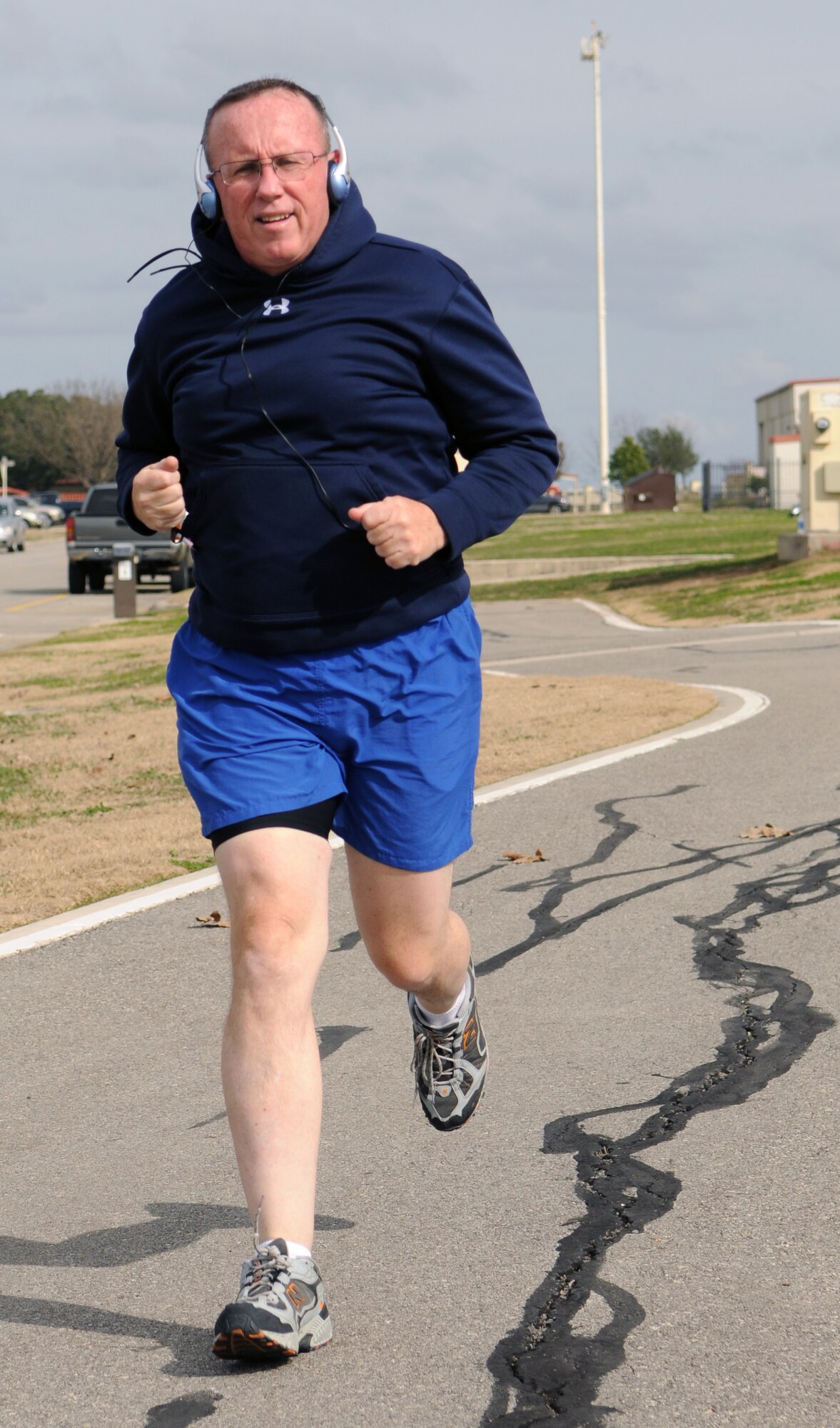 Mike Porter, 12th Force Support Squadron assistant lodging manager,  runs as part of his work out routine after receiving bariatric surgery at Wilford Hall Medical Center at Lackland Air Force Base. (Photo by Don Lindsey)