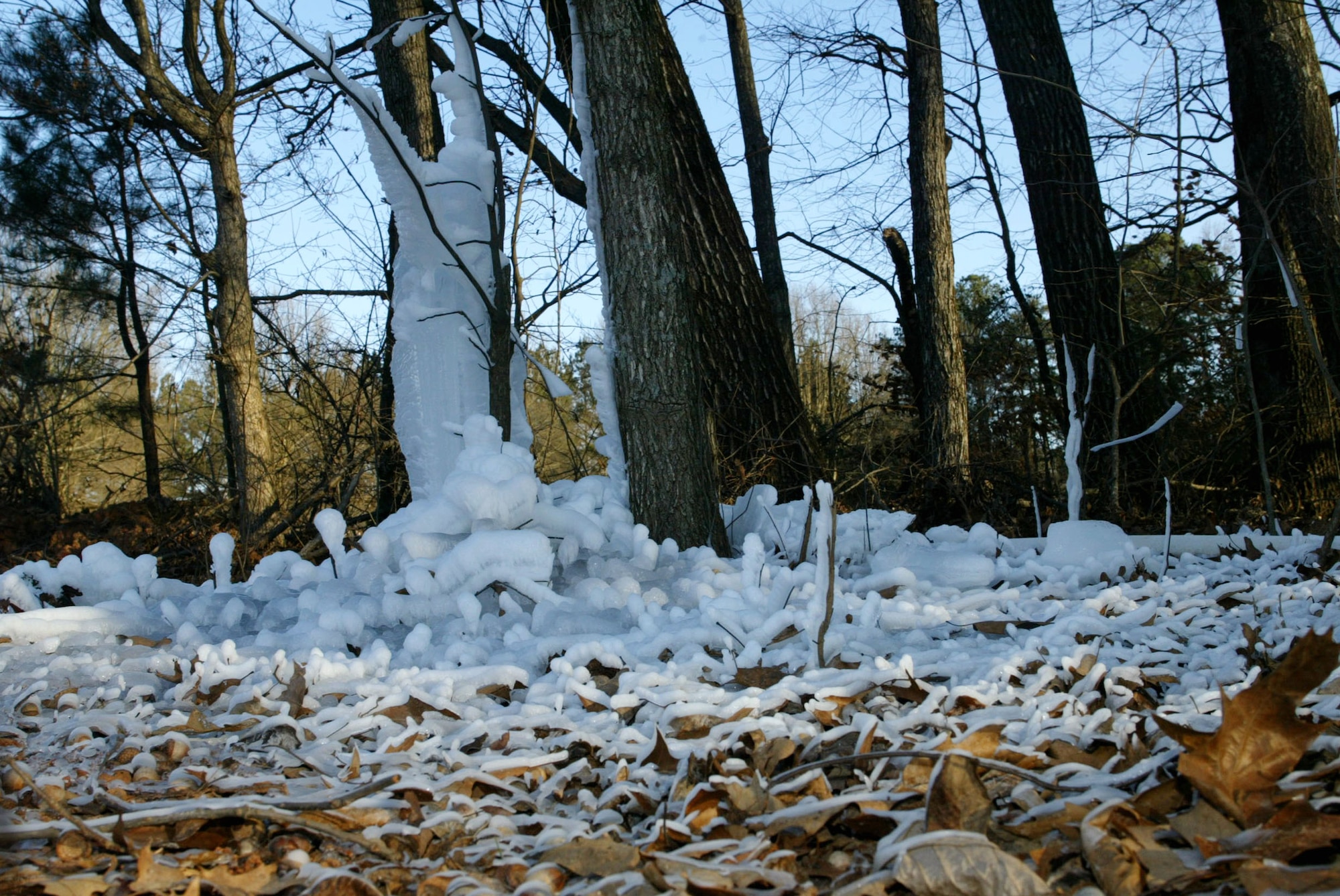 A leaking water hose supplying water to the base fitness center is responsible for this massive ice sculpture Jan. 5. Metro Atlanta, including Dobbins Air Reserve Base, has experienced freezing temperatures for several days with wind chills as low as 4 degrees. Forecasters predict a chance of snow Thursday evening. Call 678-655-2333 for any delays or base closures. (U.S. Air Force photo/Don Peek)

