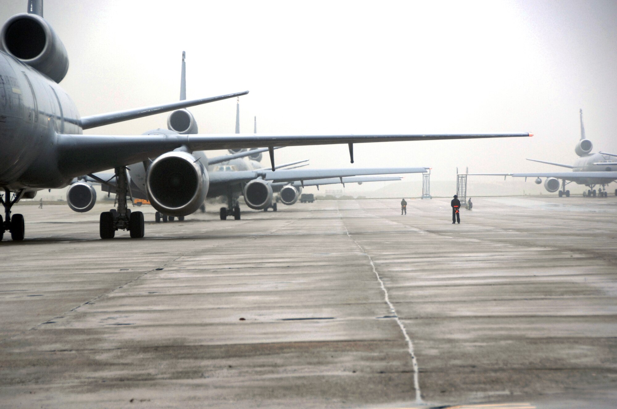 Aircraft prepare to take off Dec. 21 during Travis' first-ever mass launch of nine aircraft. The Total Force launch effort was an opportunity for operations, maintenance and support personnel to train together on a larger scale than normal. (U.S. Air Force photo/Nan Wylie)