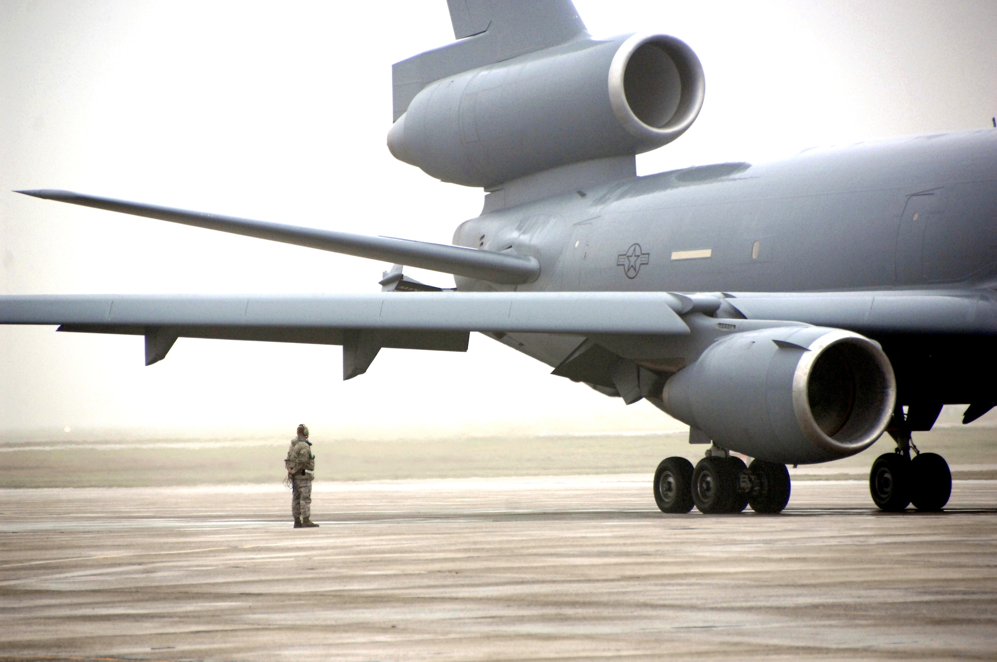 A KC-10 Extender prepares to take off Dec. 21 during Travis' first-ever mass launch of nine aircraft. The Total Force launch effort was an opportunity for operations, maintenance and support personnel to train together on a larger scale than normal. (U.S. Air Force photo/Amanda Lopez)