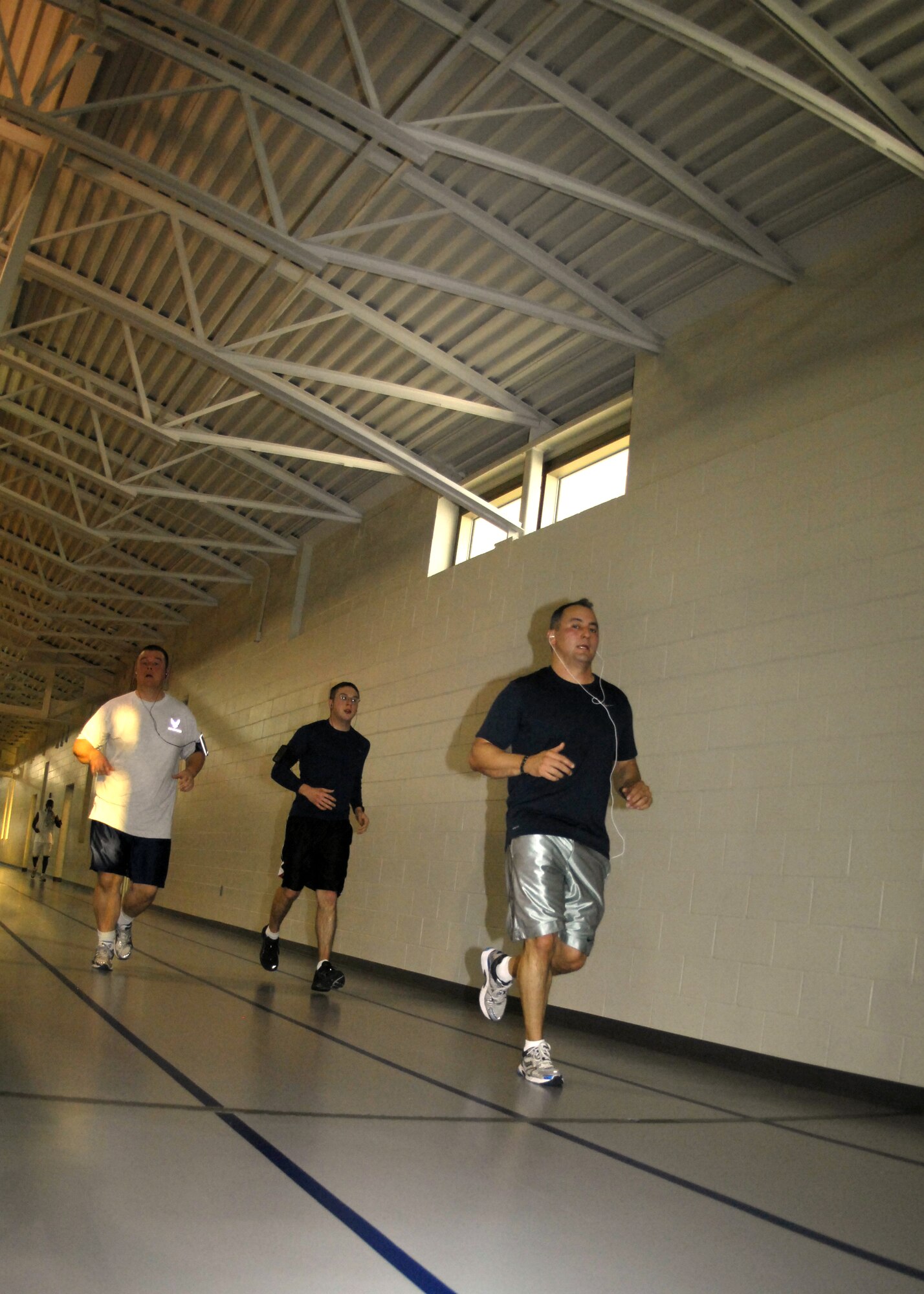 MINOT AIR FORCE BASE, N.D. -- Members of the 5th Maintenance Squadron participated in the New Years Eve Half Marathon at the McAdoo Fitness Center to bring in the new year here Dec. 31. Participants had to complete a total of 105 laps which totaled 13.1 miles and were provided with snacks and drinks. (U.S. Air Force photo by Airman 1st Class Ashley N. Avecilla)