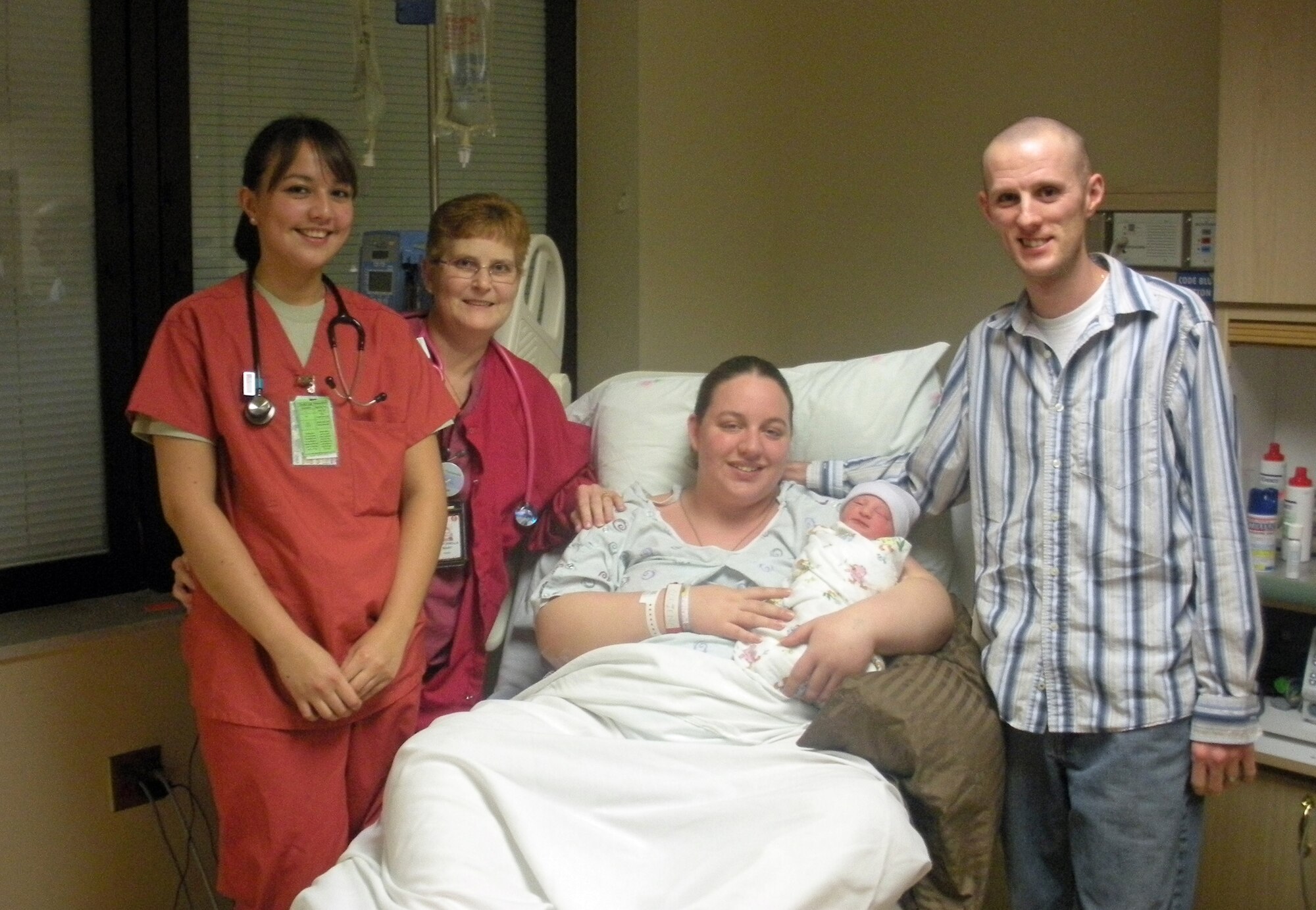 New parents Erick and Nicole Muncy proudly show off their newborn son, Dravyn Dane Muncy, at Wright-Patt Medical Center, Jan. 1.  Dravyn was the first baby born this year in the Dayton area.  Dravyn came into this world weighing in at 7-pounds 2-ounces and was 21.4-inches-long.  