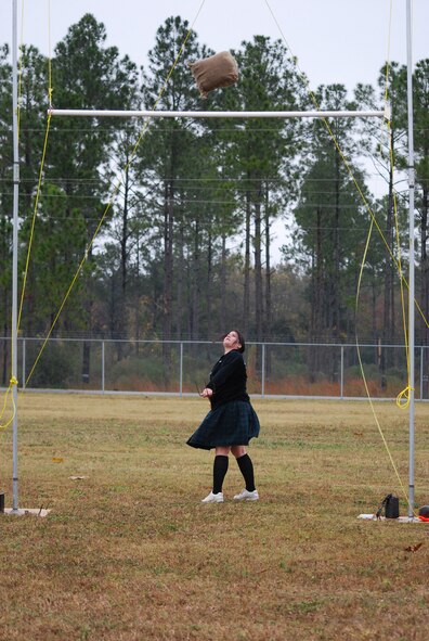 MOODY AIR FORCE BASE, Ga. -- A participant of the Scottish Highland Games watches a 16-pound burlap bag as it goes over a horizontal bar here Dec. 12. According to the Southeastern Scottish Amateur Athletic Association, the Scottish Highland Games began around the year 1057 as a way for Scottish rulers to improve the military and choose the best men for a king or chief's personal guard. (U.S. Air Force photo by Senior Airman Calinn Weber)