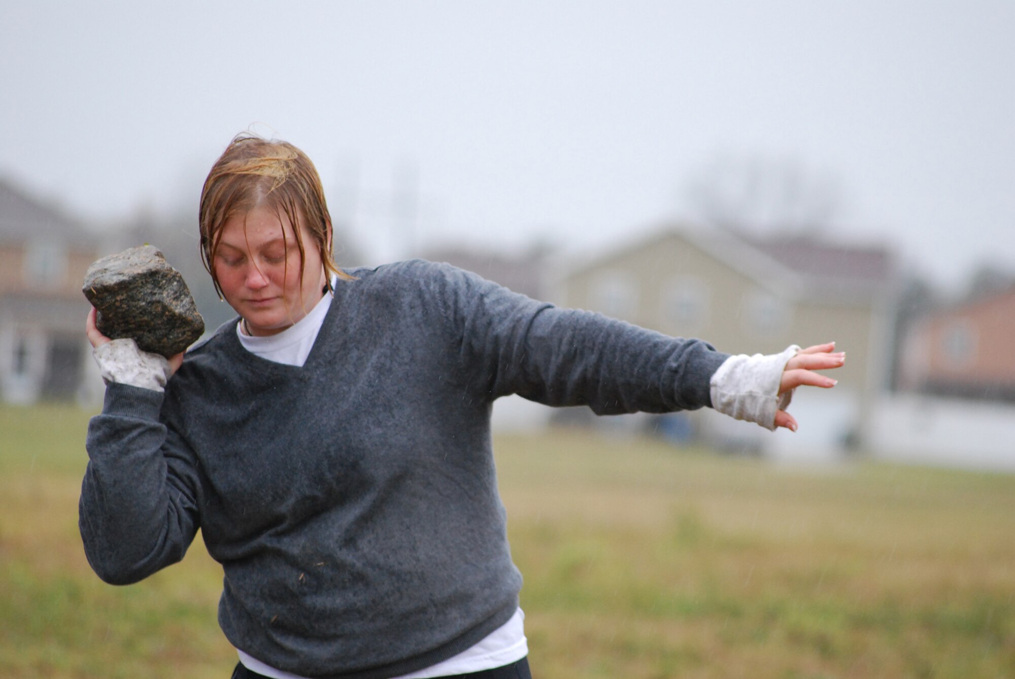 MOODY AIR FORCE BASE, Ga. -- A participant of the Scottish Highland Games attempts to toss a stone here Dec. 12. Contestants are allowed three tosses and only the longest one is judged. (U.S. Air Force photo by Senior Airman Calinn Weber)