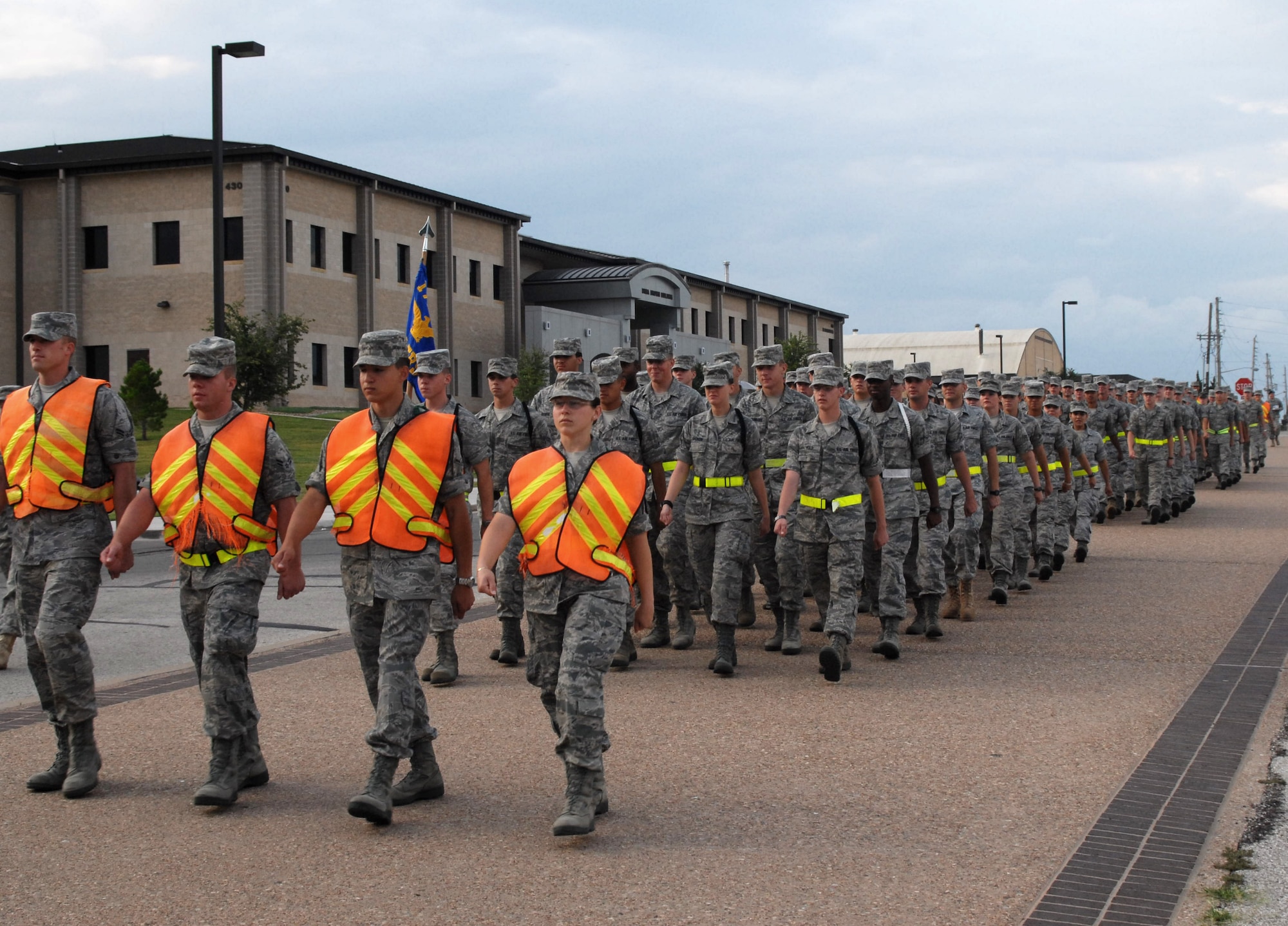 Air Force students from the 316th Training Squadron march past the Norma Brown Building on their way to class on Goodfellow AFB, Texas.  The 316 TRS trains cryptologic intelligence and electronic systems and maintenance specialists for the Department of Defense.  (U.S. Air Force photo/Robert D. Martinez)