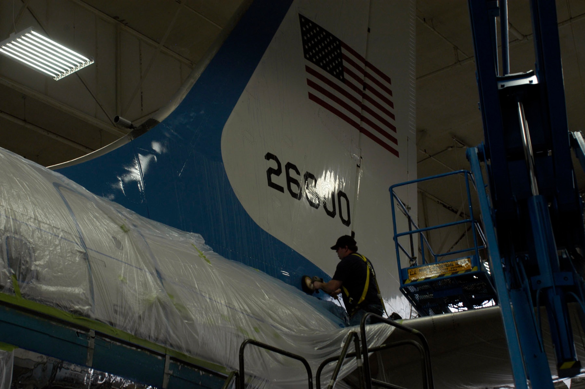 DAYTON, Ohio - Restoration specialists prepare SAM 26000 for painting in the restoration hangar at the National Museum of the U.S. Air Force. (U.S. Air Force photo)