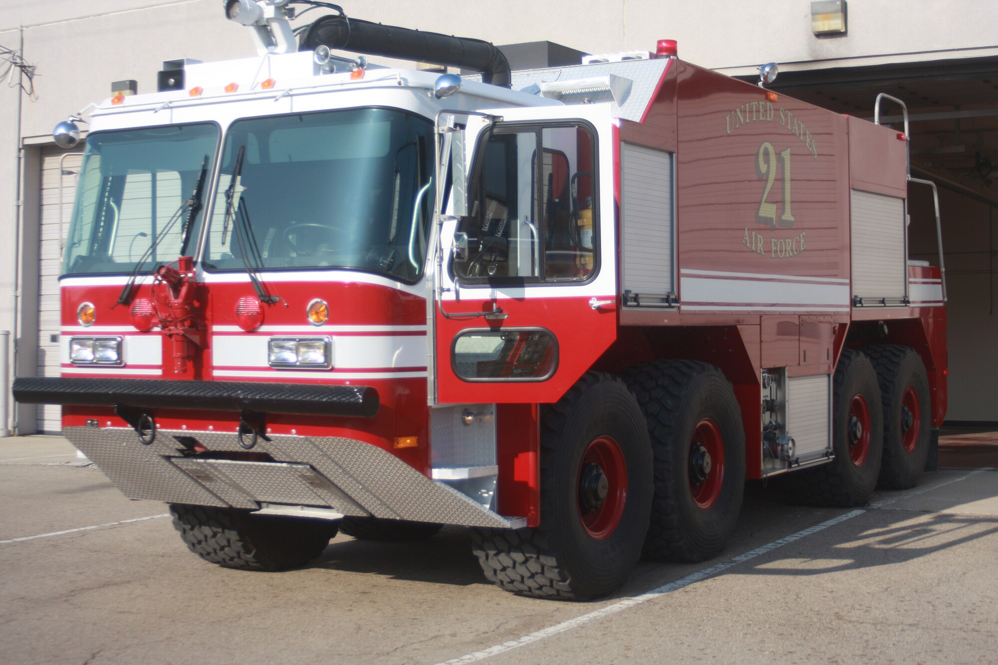 WRIGHT-PATTERSON AIR FORCE BASE, Ohio – A fire truck belonging to the 445th Airlift Wing stands by as the firefighters prepare to head out of the station for a training scenario during a unit training assembly.  Firefighters from the wing continuously train for all possible scenarios that may arise at the wing or an incident they may have to respond to. (U.S. Air Force photo/Staff Sgt. Amanda Duncan)
