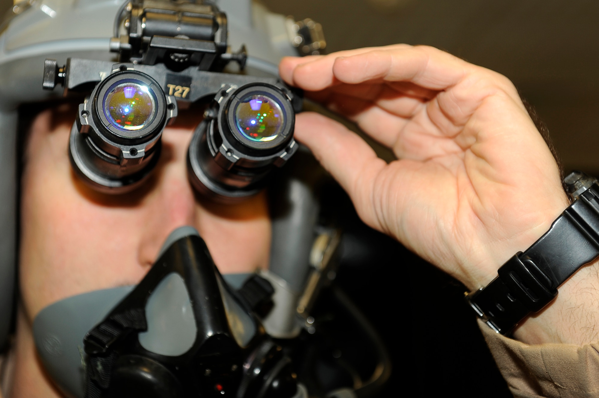 BAGRAM AIRFIELD, Afghanistan--U.S. Air Force Capt. David Snodgrass, 79th Expeditionary Fighter Squadron, operational checks his night vision goggles before his flight Jan. 4, 2010.  Snodgrass is from Ft. Worth, Texas and is stationed at Shaw Air Force Base, S.C. (U.S. Air Force photo by: Tech. Sgt. Jeromy K. Cross)