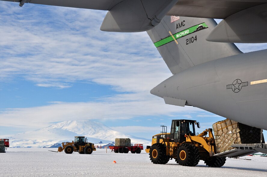 Team McChord Airmen conduct an Operation Deep Freeze mission at Pegasus Field, near McMurdo Station, Antarctica. Through Operation Deep Freeze, the Defense Department provides logistical support to research activities in Antarctica. (U.S. Air Force photo/Staff Sgt. Robert Tingle)