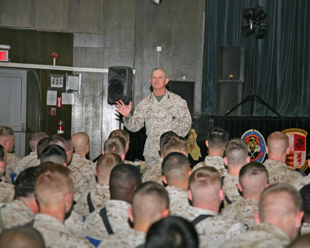 Lt. Gen. Dennis Hejlik, commanding general of II Marine Expeditionary Force, speaks with Marines during a town hall meeting at the theater aboard Al Asad Air Base, Iraq, Jan. 6, 2010. During the meeting, Hejlik expressed his gratitude for the hard work of the Marines deployed with II MEF (Forward).